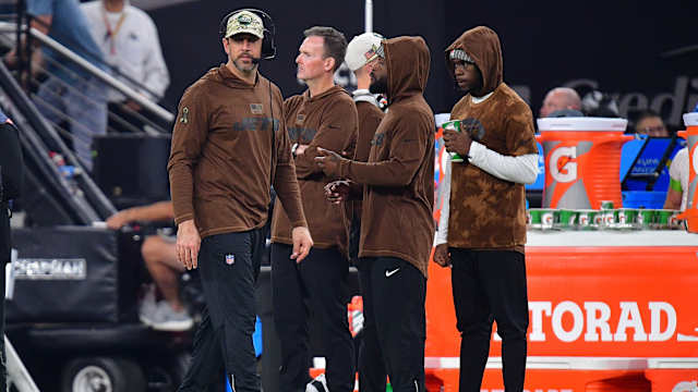 Jets' QB Aaron Rodgers walks the sideline on Sunday Night Football in Las Vegas
